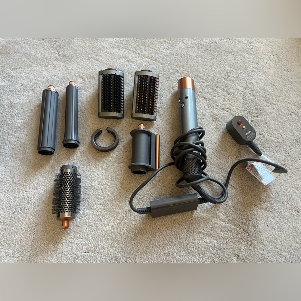 Dyson Gray Power Plug with Red and Yellow Buttons